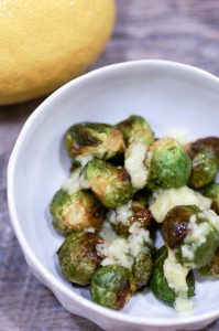 Roasted Brussels Sprouts with Whole Lemon Vinaigrette is an easy, three-ingredient side dish with tons of flavor. #brusselssprouts #lemon vinaigrette #easysidedish