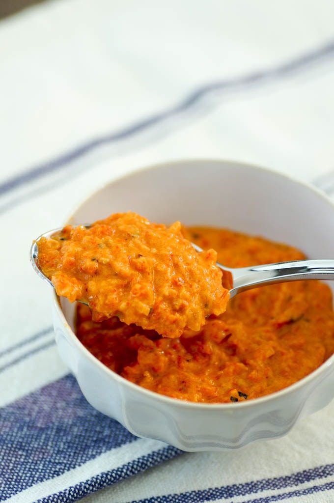 Smoky Roasted Red Pepper Sauce is the perfect way to add flavor to almost anything. Made of roasted vegetables and smoked paprika, it's sweet with a hint of smokiness. This sauce pairs well with meat, pork, chicken, vegetables, and even works well as a salad dressing! #Vegetarian #veganoption #gluten-free #dairy-free.