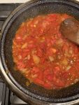 simmering tomatoes