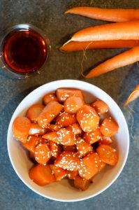 Maple Tahini Glazed Carrots are a sweet and savory side dish that will taste perfect on your Thanksgiving table. Even better, these carrots are prepared entirely on the stovetop, and take only minutes to cook.