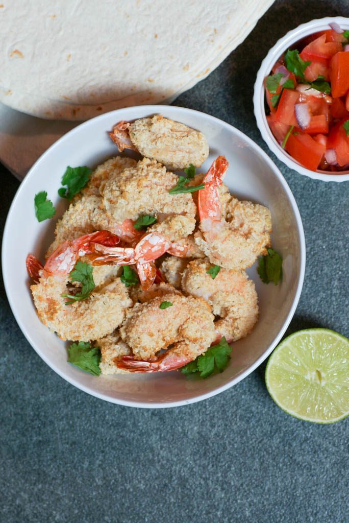 Air Fryer Fried Shrimp is an easy way to make light and crispy shrimp in no time. Freeze half of the batch to have on hand for a quick weeknight meal. #airfryer #airfryershrimp #friedshrimp #whitecoatpinkapron